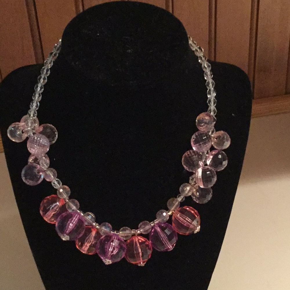 Stunning pastel necklace with crystal.